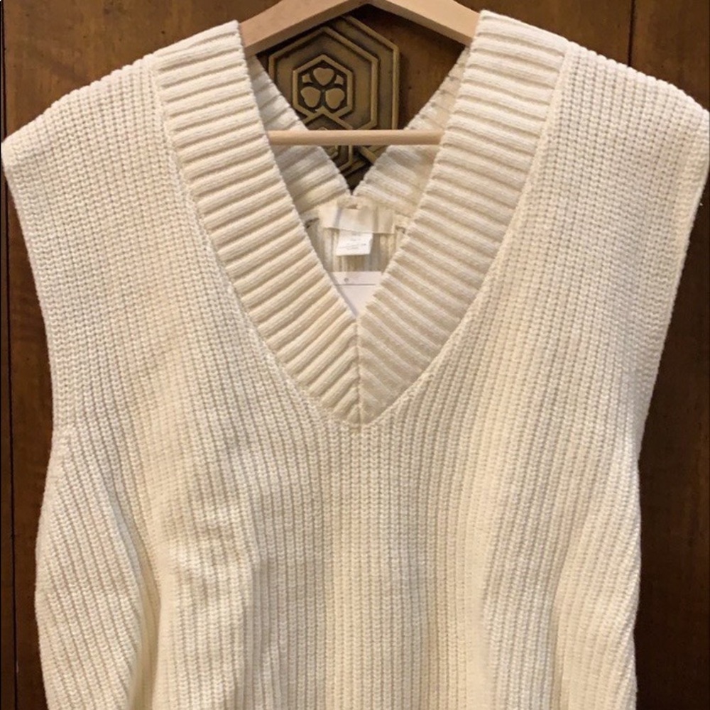 super cozy and on trend white sweater vest!